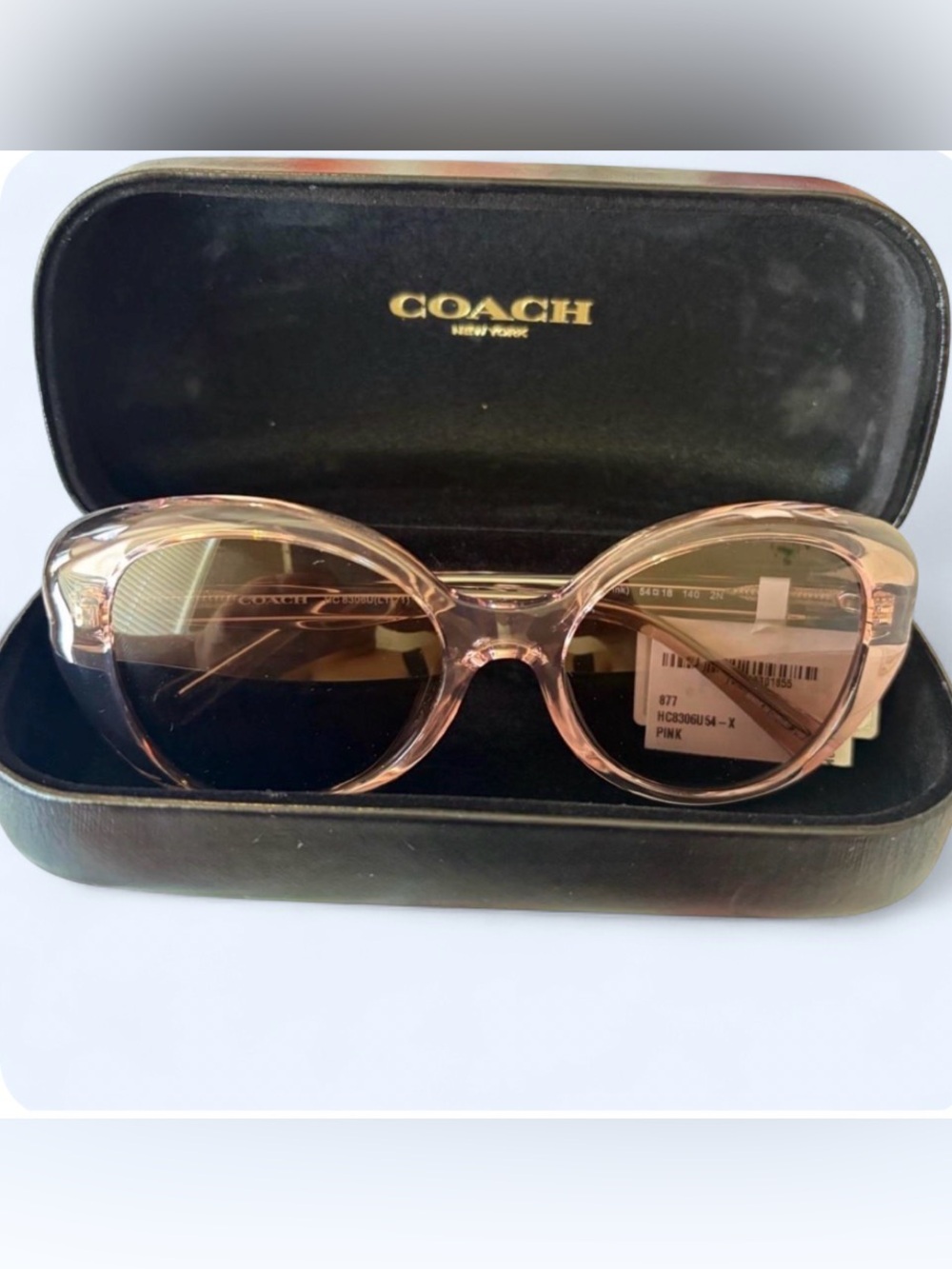 Coach Translucent Rose Pink Round Sunglasses with Dark Lenses